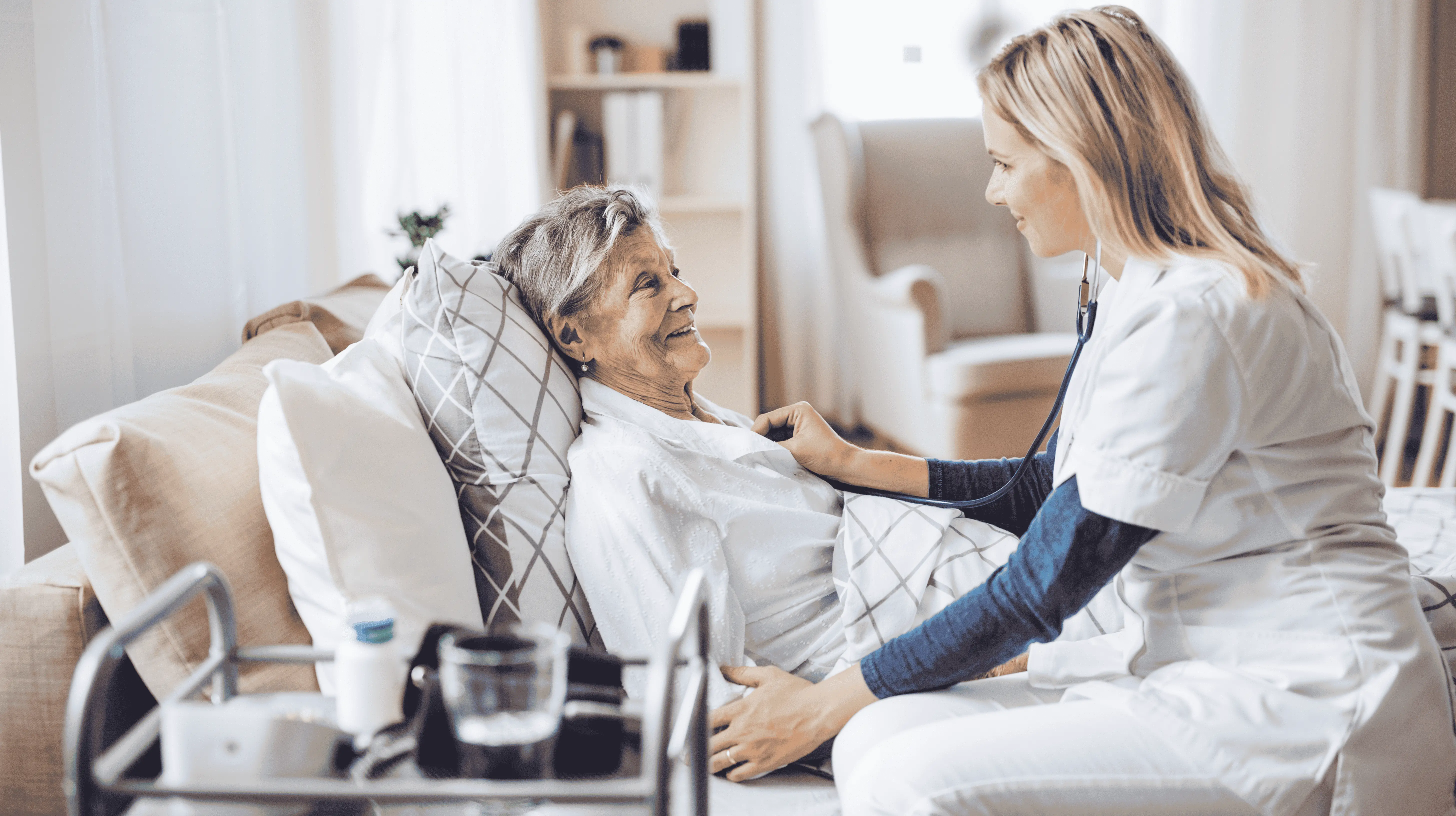 OC HomeCare nurse delivering 24/7 in-home senior care to an elderly woman in Orange County, California