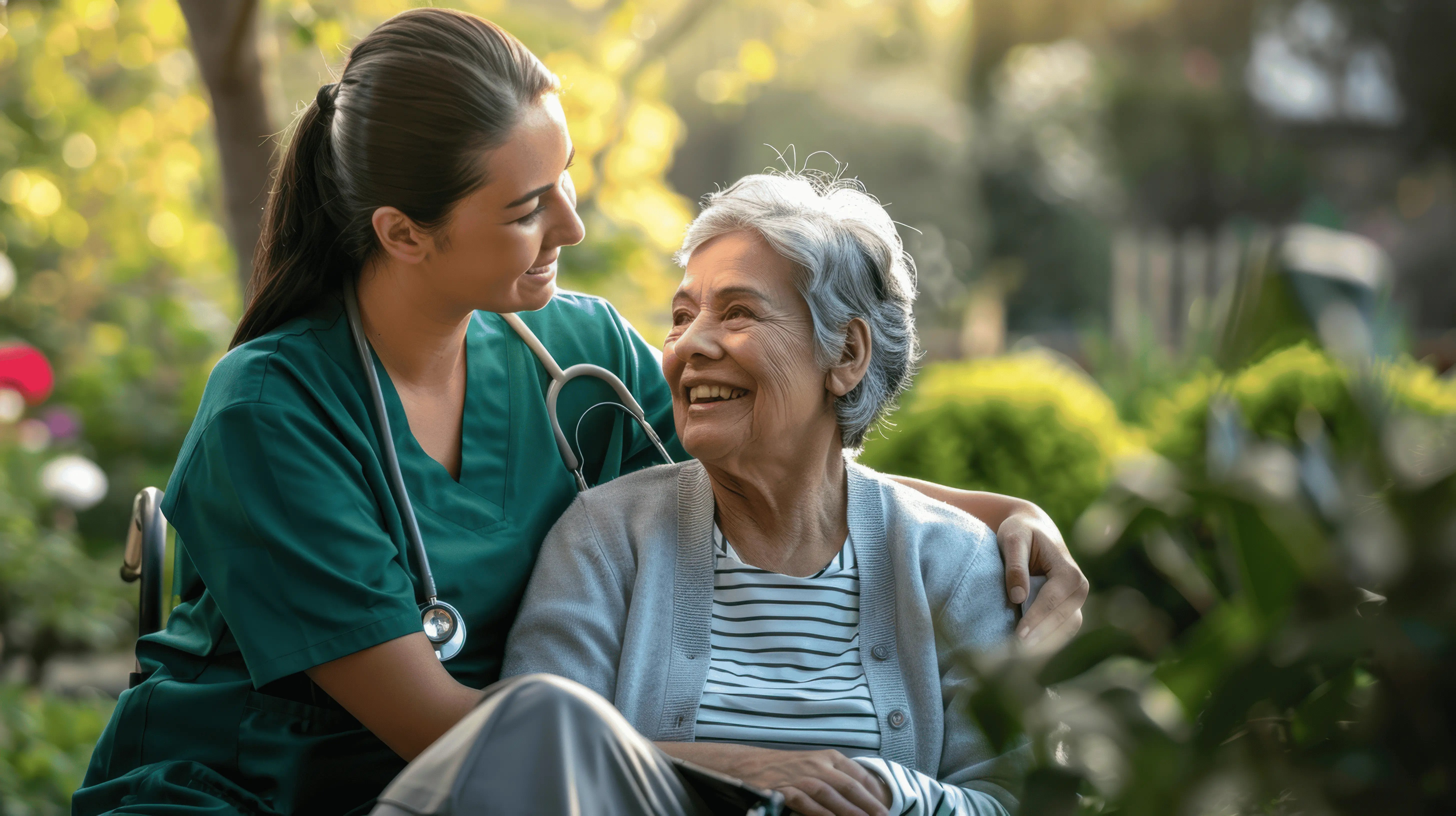OC HomeCare caregiver providing warm and friendly companion care to a senior woman in a peaceful Orange County garden