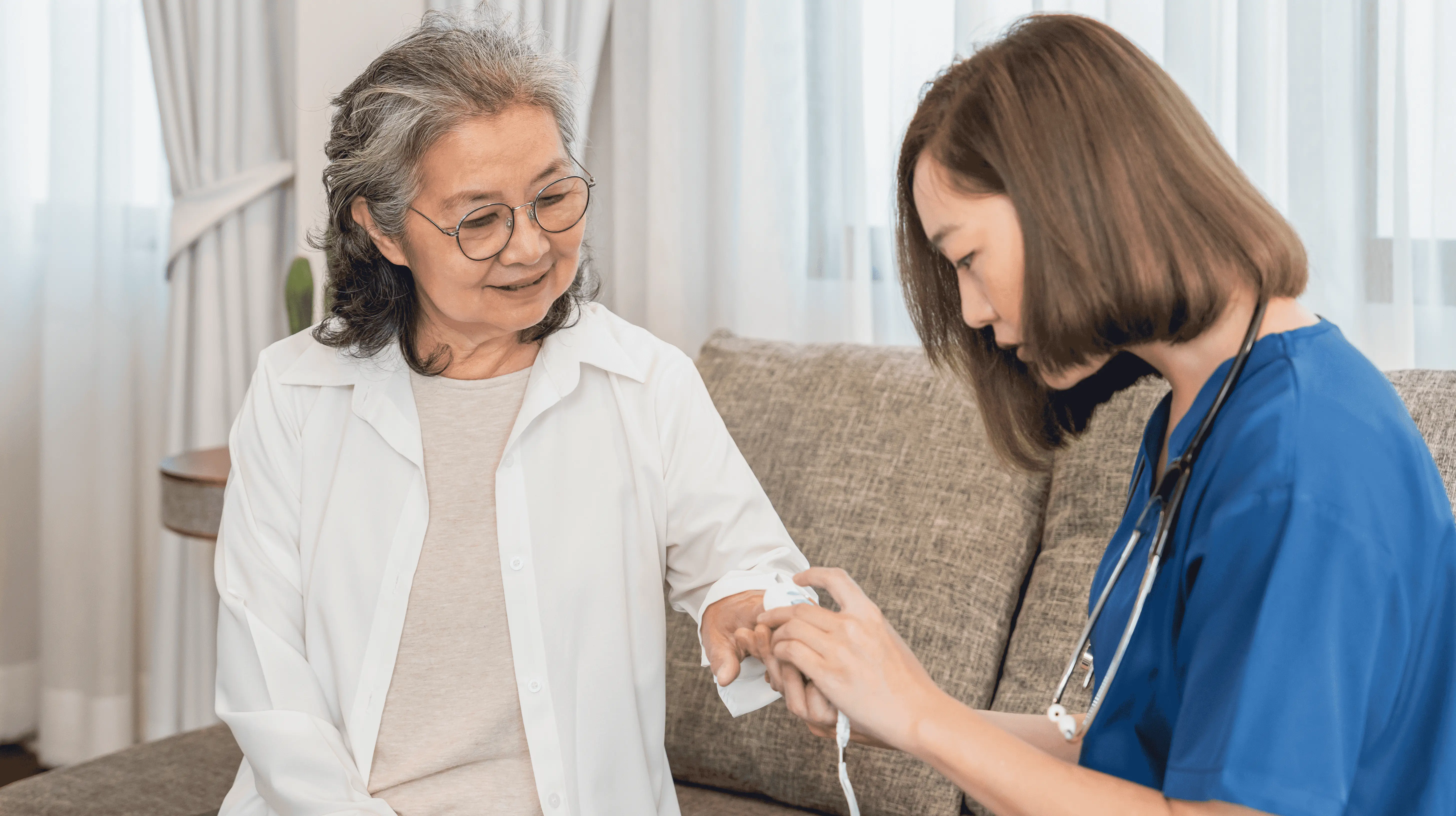 OC HomeCare nurse providing personal hygiene and daily living assistance to a senior woman at home in Lake Forest, Orange County